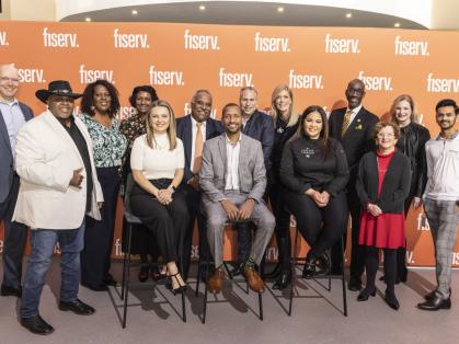Leaders from Fiserv and Rutgers-Newark with recipients of the company's Back2Business grants. Photo: Tamara Fleming