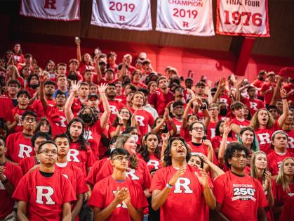 Rutgers students cheering at a sports game