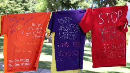 VPVA Clothesline Project – three shirts hanging with statements from survivors written on them
