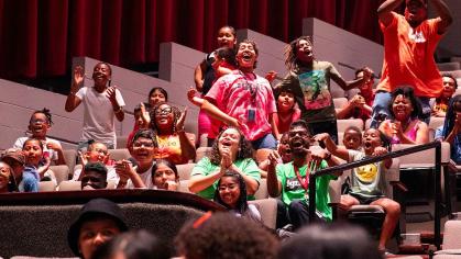 Students, family, and friends cheer on Rutgers Future Scholars at the RFS Summer Showcase, held at the Walter K. Gordon Theater.