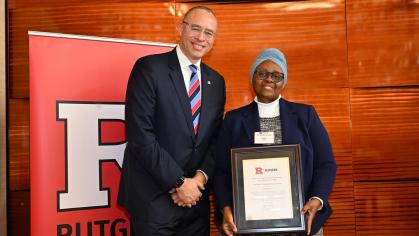 President Jonathan Holloway with Emilia Iwu, clinical associate professor and assistant dean at the Center for Global Health who was honored with the individual Rutgers Outstanding Service Award.