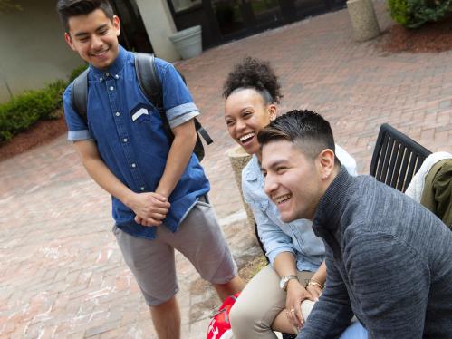 three Rutgers-Newark students sitting outside