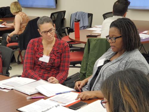 Maribel & Tynisha participating in a mentoring workshop along with a diverse group of faculty