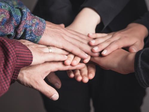 hands from diverse backgrounds