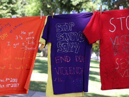 VPVA Clothesline Project – three shirts hanging with statements from survivors written on them