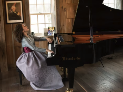 Rutgers music professor Min-Kyung Kwon playing the piano