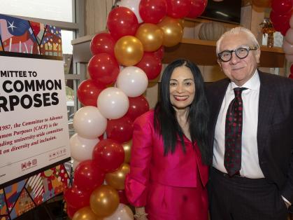 Gloria Bonilla-Santiago, who stands with her husband, Michele Pastorello, received the Clement A. Price Human Dignity Award from the Committee to Advance Our Common Purposes. Nick Romanenko/Rutgers University
