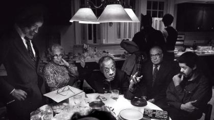 Michelle Agins, "James Baldwin introduces his new book 'Evidence of Things Not Seen' at the home of Lerone Bennett in Chicago," 1983. © Michelle V. Agins