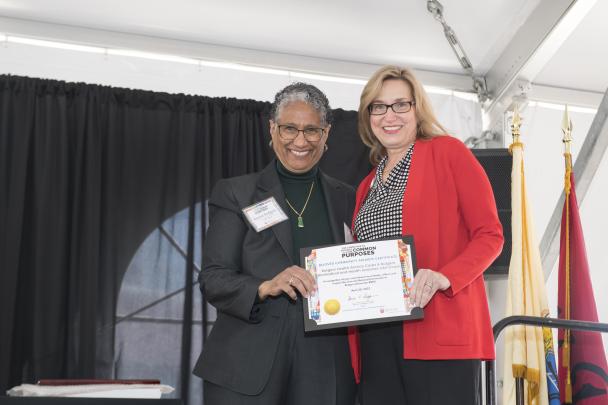 Denise Rodgers (MD), Vice Chancellor Interprofessional Programs, RBHS , CACP Chair, pictured with Beloved Community Award recipient for Rutgers Health Service Corps & Rutgers Biomedical and Health Sciences VAX Corps (RBHS)
