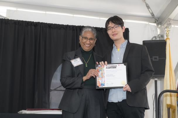 (l. to r.)Denise Rodgers (MD), Vice Chancellor Interprofessional Programs, RBHS , CACP Chair, pictured with Beloved Community Art Award 2nd place winner for Literary Arts category, Zeyue Li (New Brunswick)