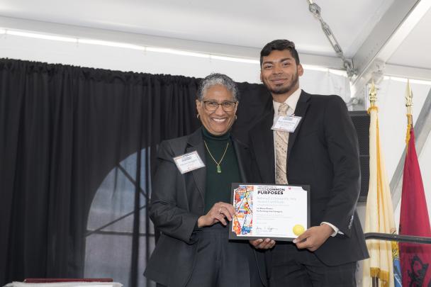 (l. to r.)Denise Rodgers (MD), Vice Chancellor Interprofessional Programs, RBHS , CACP Chair, with Beloved Community Art Award 1st place winner for Performing Arts category, Ryan Hemnarine (Newark)