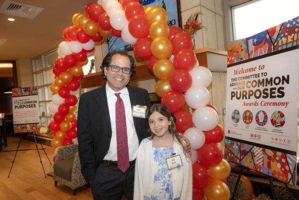 (l. to r.) David Salas-de la Cruz, Associate Professor of Chemistry/ Director of Chemistry Graduate Program, and recipient of the Torchbearer Award pictured with his daughter, Mila Salas at the Committee to Advance our Common Purposes Awards Ceremony