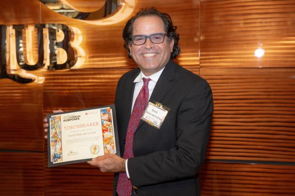 David Salas-de la Cruz, Associate Professor of Chemistry and Director of the Chemistry Graduate Program and a 2024 Torchbearer Award recipient, at the Committee to Advance our Common Purposes Awards Ceremony.