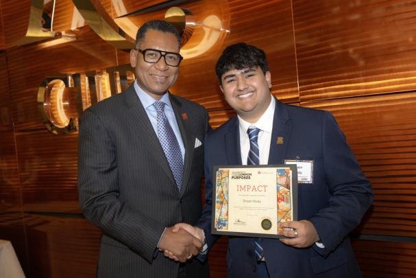 (l. to r.) Antonio D. Tillis, Chancellor of Rutgers–Camden, with Shaan Mody, an undergraduate student at Rutgers Camden College of Arts and Sciences and a 2024 Impact Award recipient at the Committee to Advance our Common Purposes Awards Ceremony.